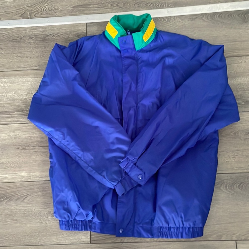Vintage 90s players by Van Heusen fold into a pouch windbreaker